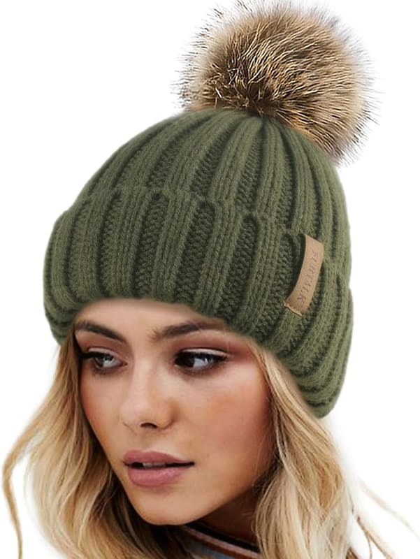 Pom pom knit beanie in pine green