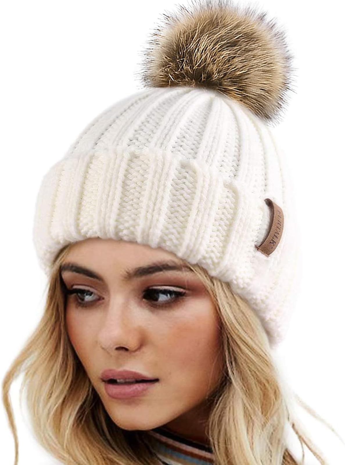 Pom pom knit beanie